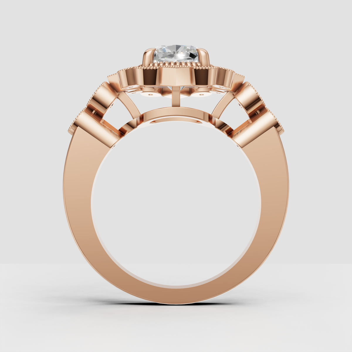 Cushion cut center stone with ornate diamond surround