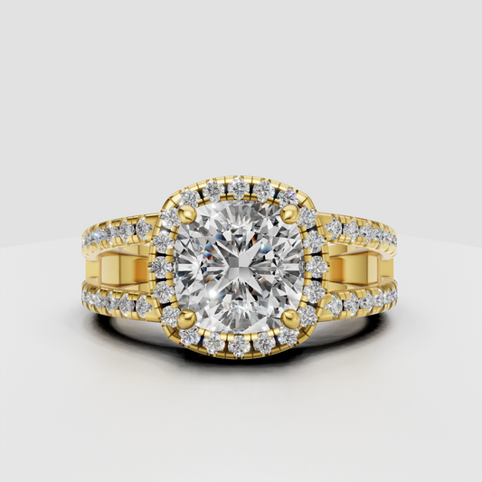 Cushion cut diamond halo engagement ring in yellow gold