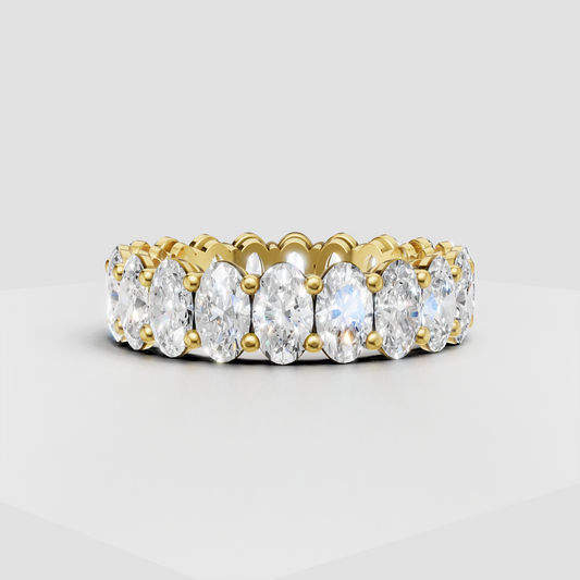 Oval diamond shared prong eternity ring in polished metal