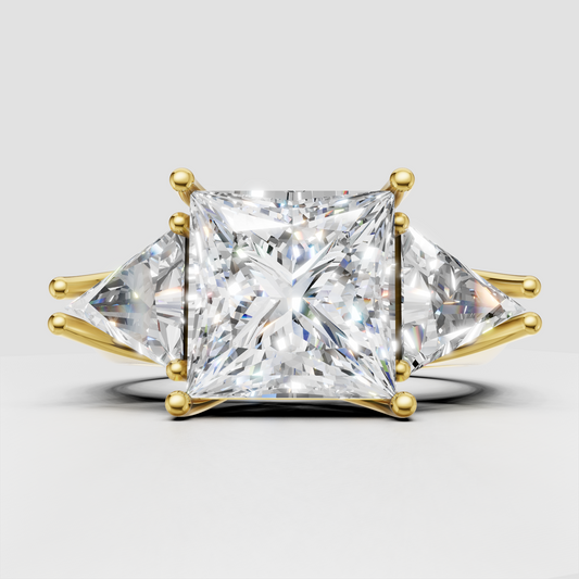 Princess cut diamond three stone engagement ring in polished yellow gold