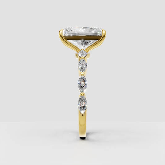 Yellow gold radiant diamond engagement ring with four prongs