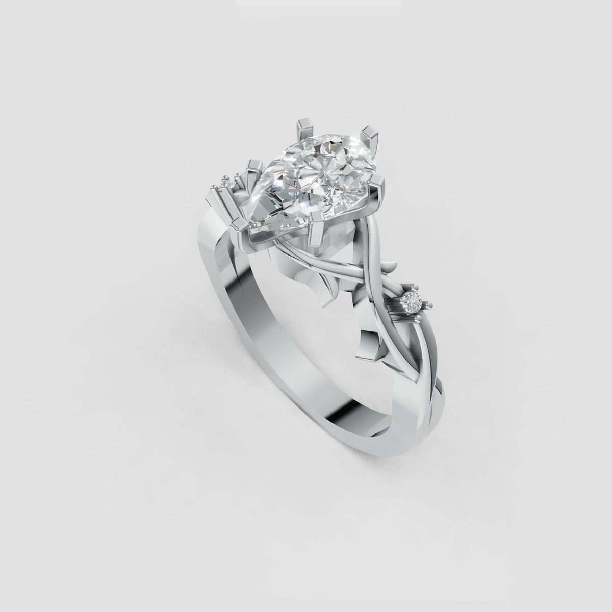 Pear diamond engagement ring with sparkling pavé side stones