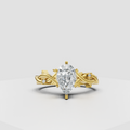 Pear diamond prong multi-row pavé engagement ring in yellow gold