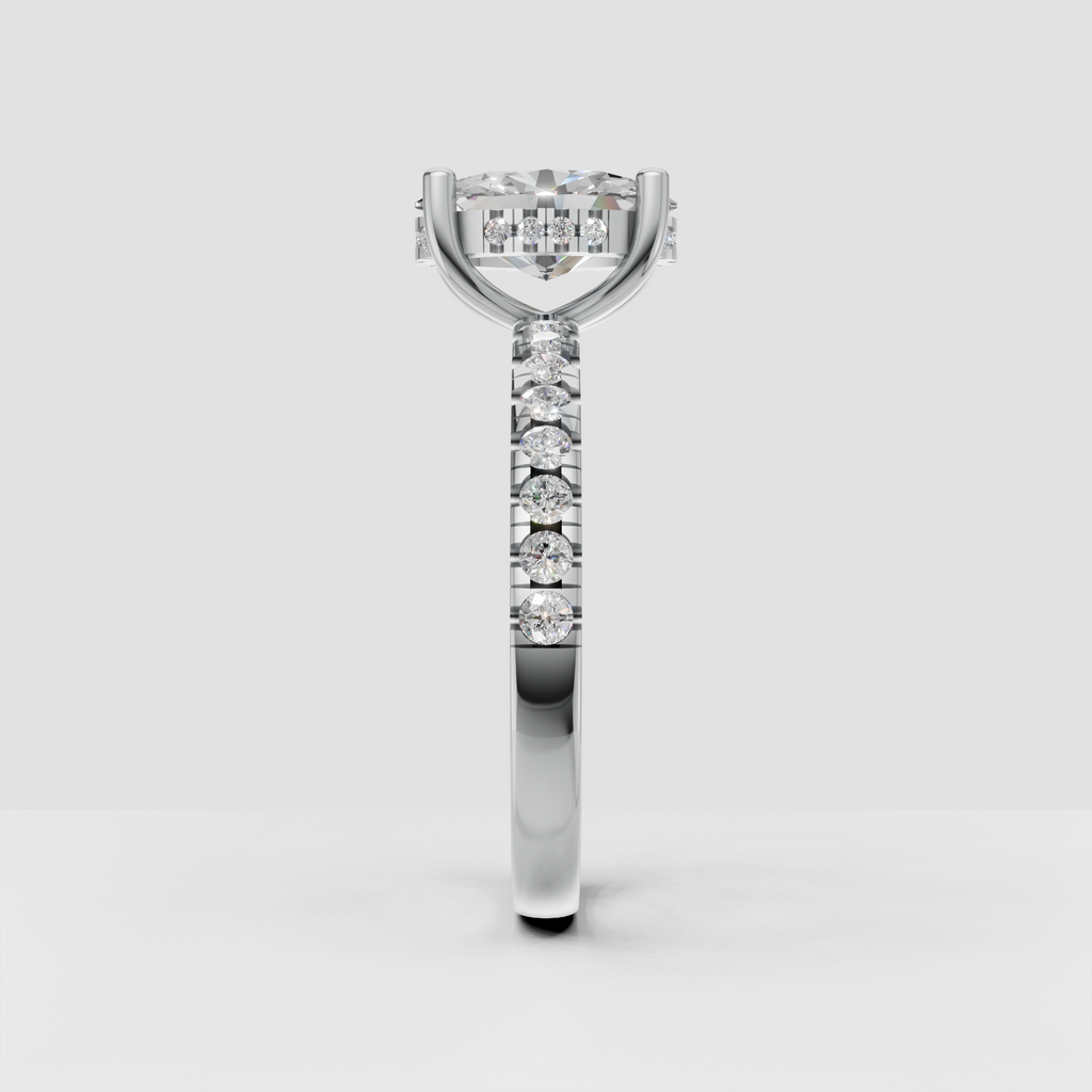 Oval cut diamond bridal ring with hidden halo and smooth tapered gold shank.