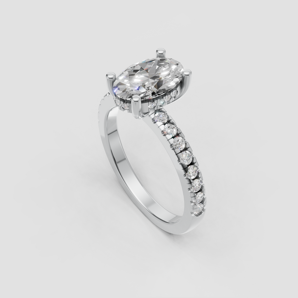 Close-up oval diamond engagement ring with polished gold band and elegant four-prong setting.