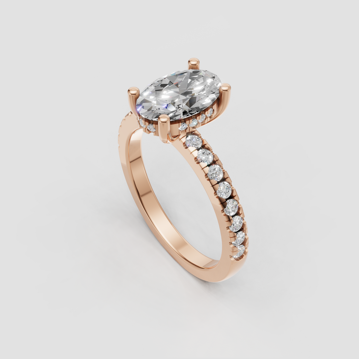 Oval diamond proposal ring with elegant solitaire setting and sparkling hidden halo detail.