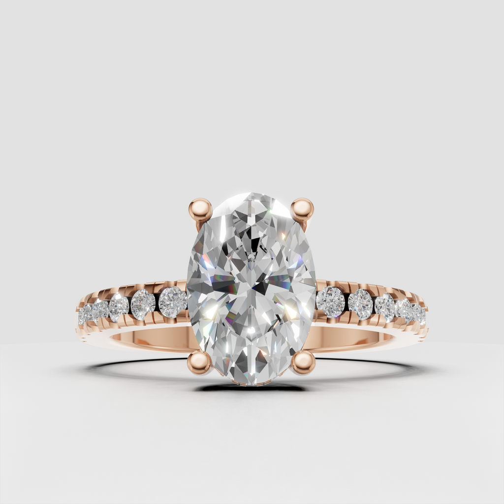 Refined oval diamond wedding ring with four-prong setting and sleek gold band.