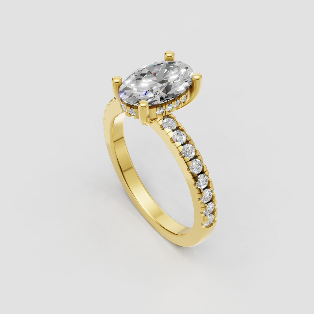 Oval diamond ring featuring a sleek solitaire setting, discreet hidden halo, and tapered gold band.