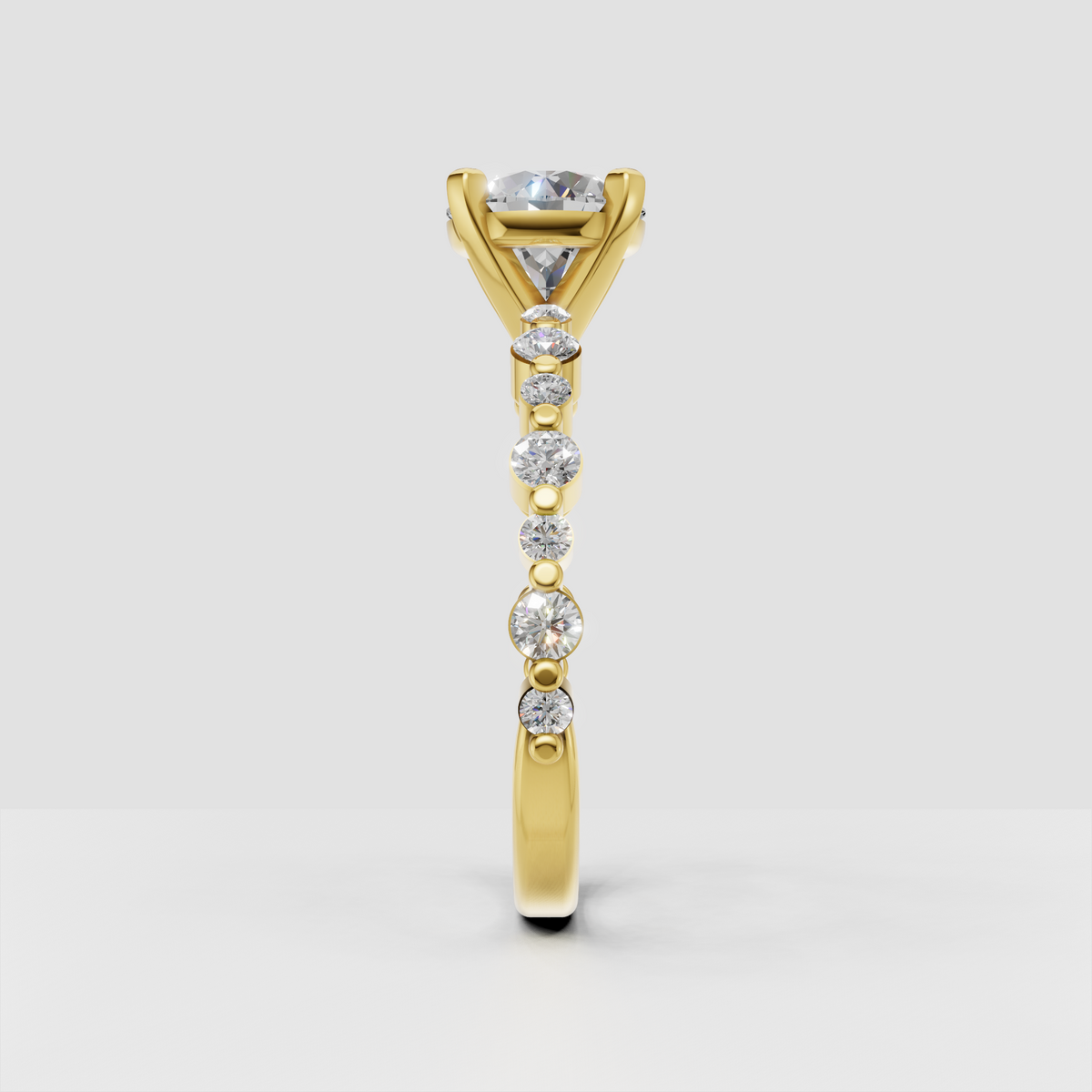 Princess diamond solitaire ring featuring four rounded prongs and hidden halo detail