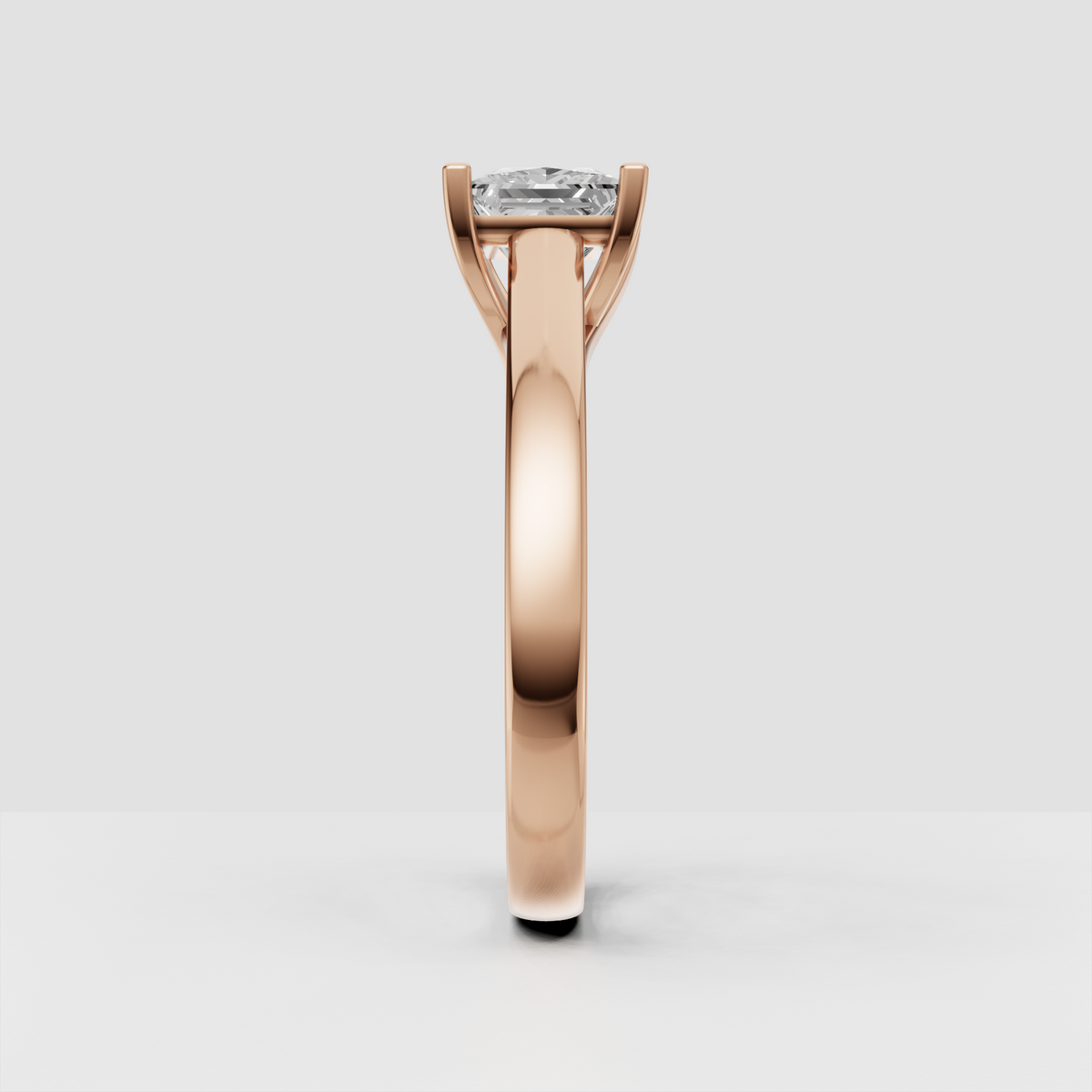 Elegant four-prong square diamond engagement ring viewed from the front