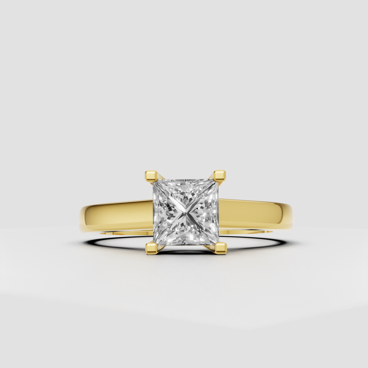 Princess cut diamond four-prong solitaire engagement ring in polished platinum