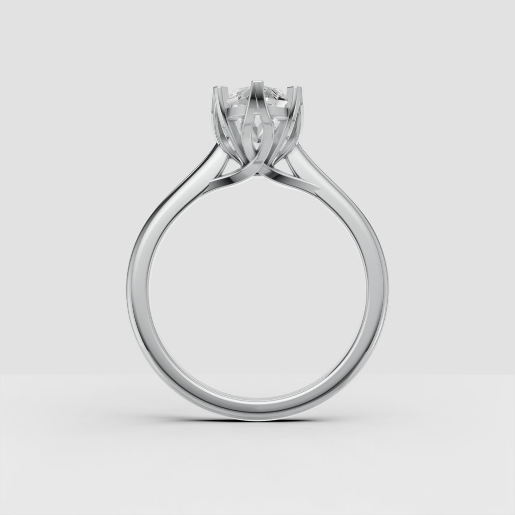 Marquise diamond engagement ring with elevated cathedral-inspired setting