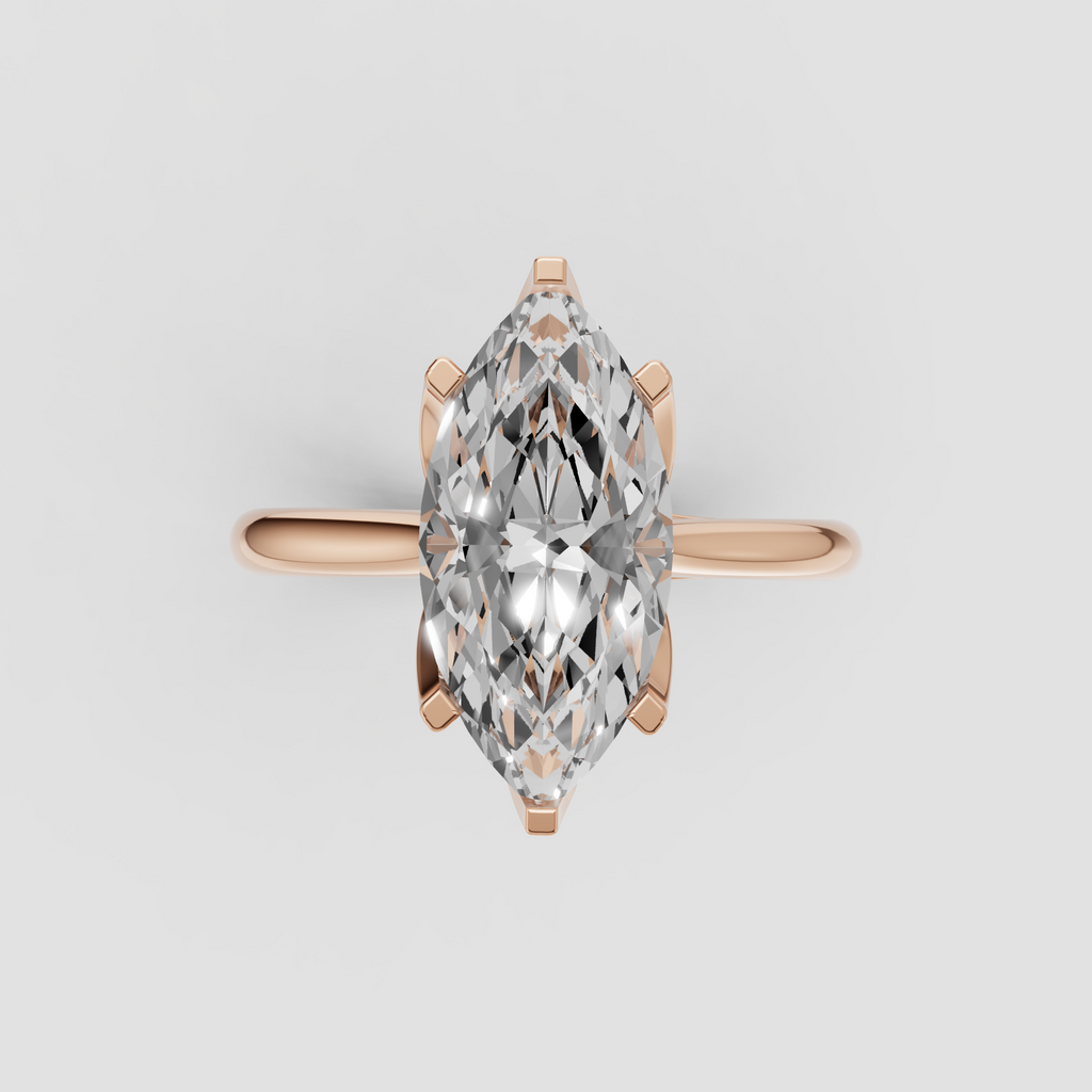 Polished platinum marquise diamond ring with smooth solitaire band