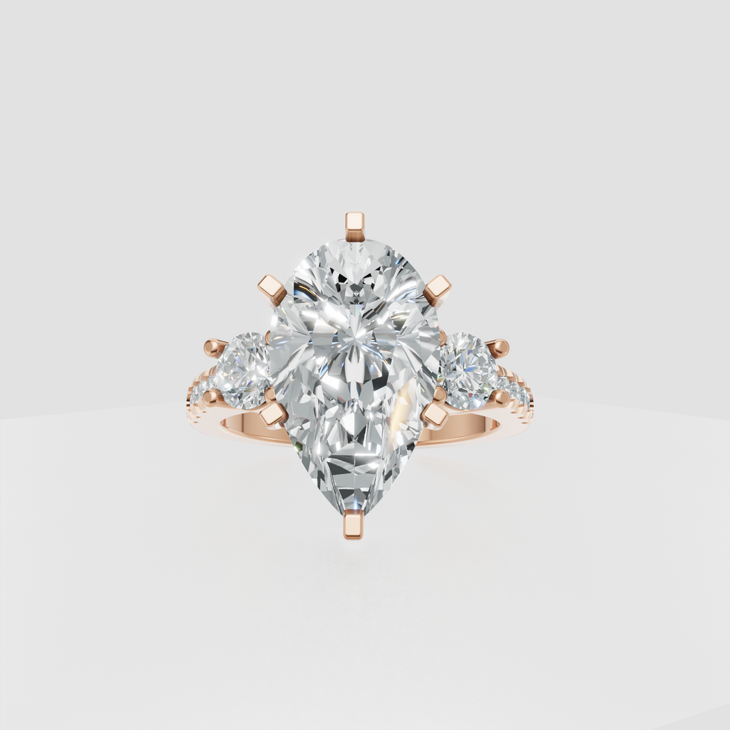 Pear-shaped center diamond with round diamond side stones