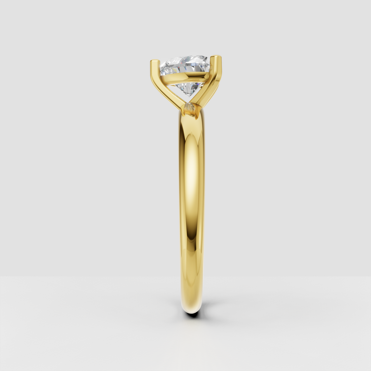 Heart cut diamond ring featuring elegant three-prong setting
