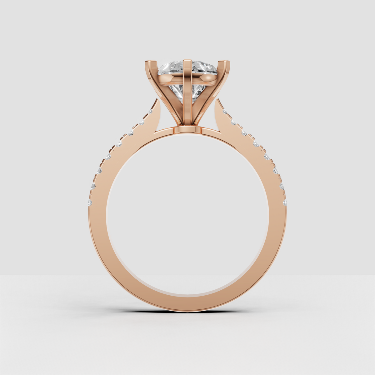 Pear-shaped diamond engagement ring side view showing elevated cathedral profile