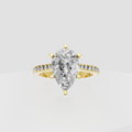 Pear diamond cathedral engagement ring with pavé-set shoulders and multi-prong setting