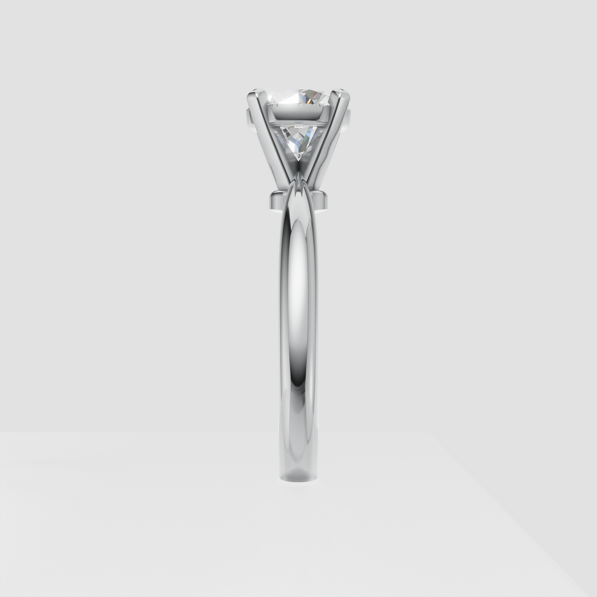 Classic round diamond ring with four-prong solitaire setting and split-shank band
