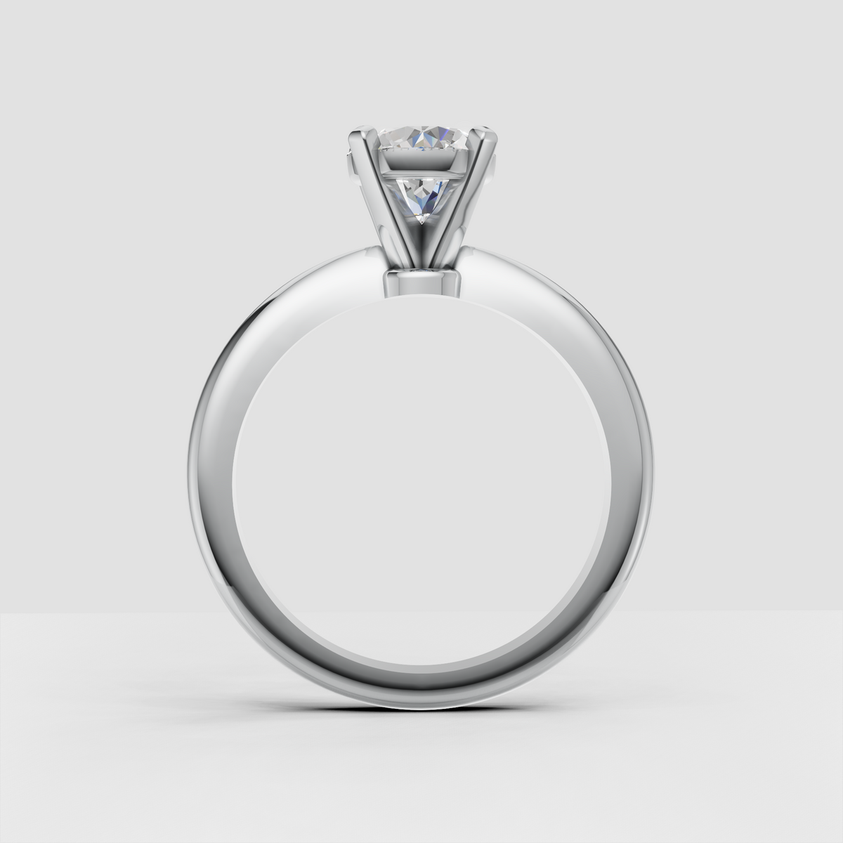 Round diamond bridal ring shown from an angled view with polished platinum finish