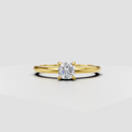 Round diamond solitaire cathedral engagement ring with four-prong setting and polished band