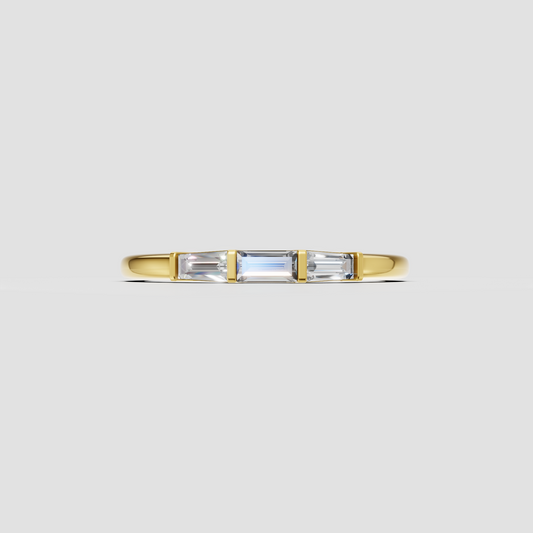 Rose gold three-stone baguette diamond engagement ring