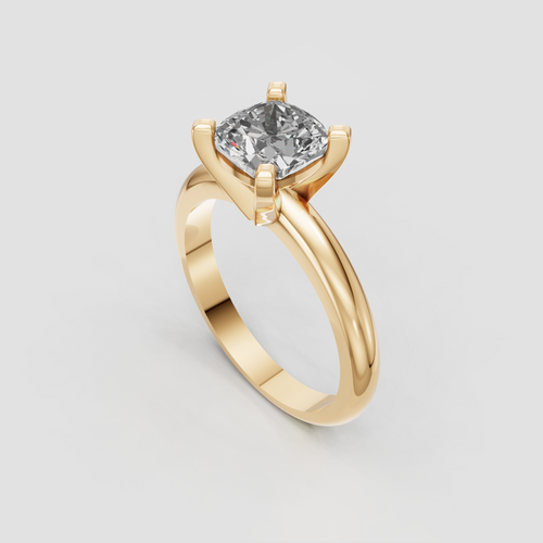 Cushion shaped diamond solitaire ring in elegant gold