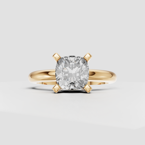 Cushion diamond solitaire engagement ring with polished band