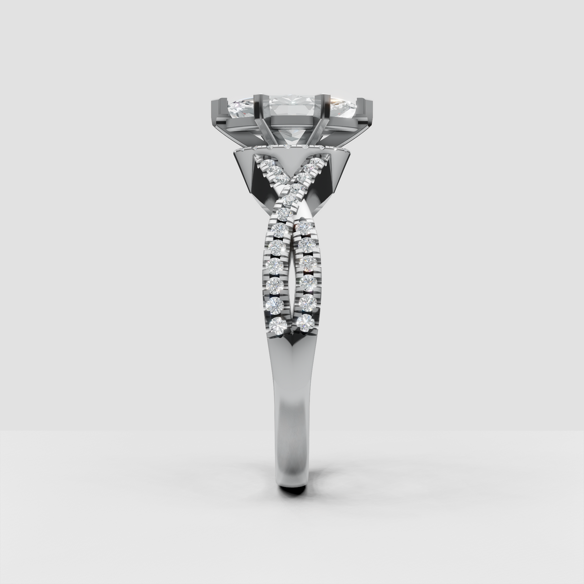 Marquise solitaire ring with crossover diamond-set shoulders