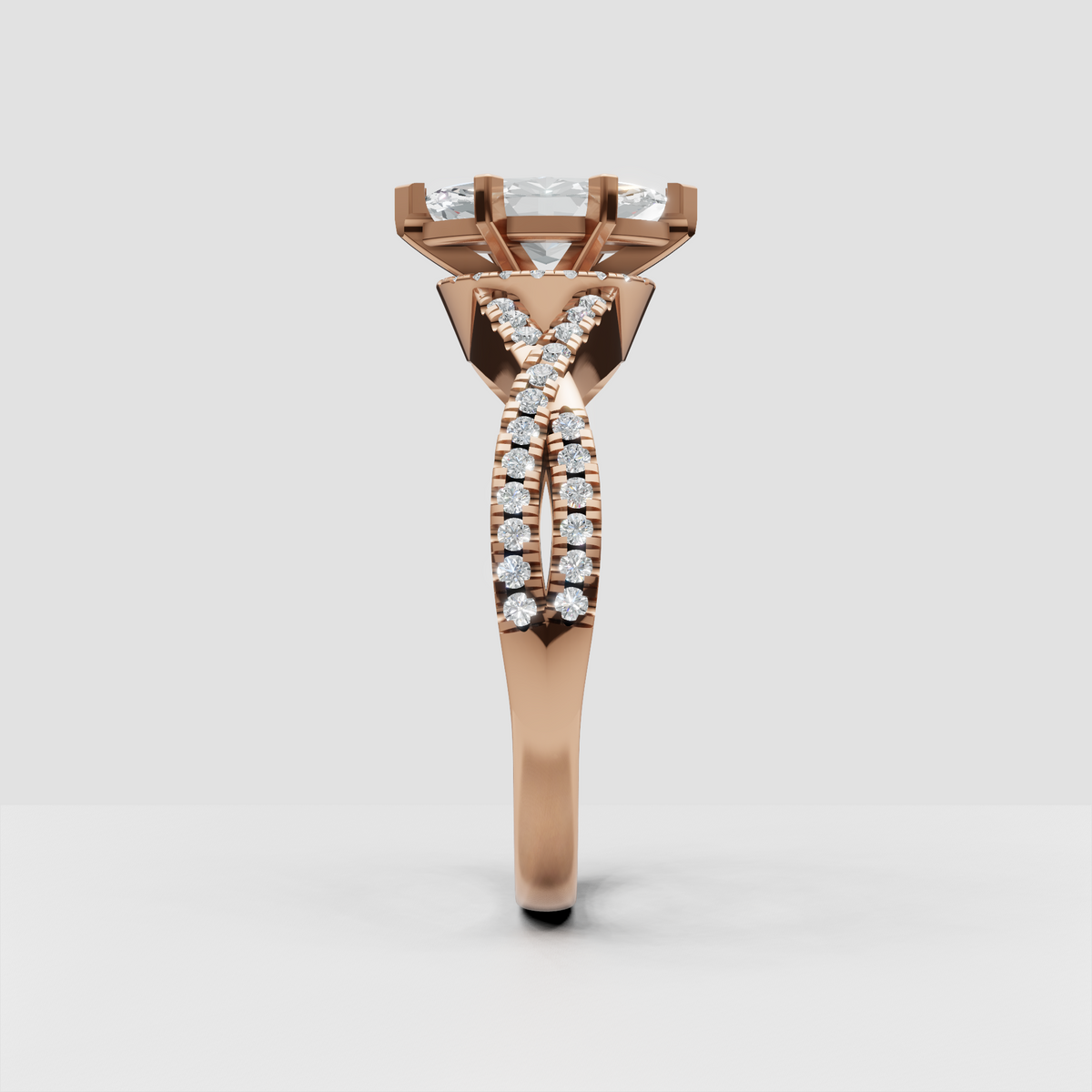 Detailed marquise engagement ring with diamond-set twisted shoulders