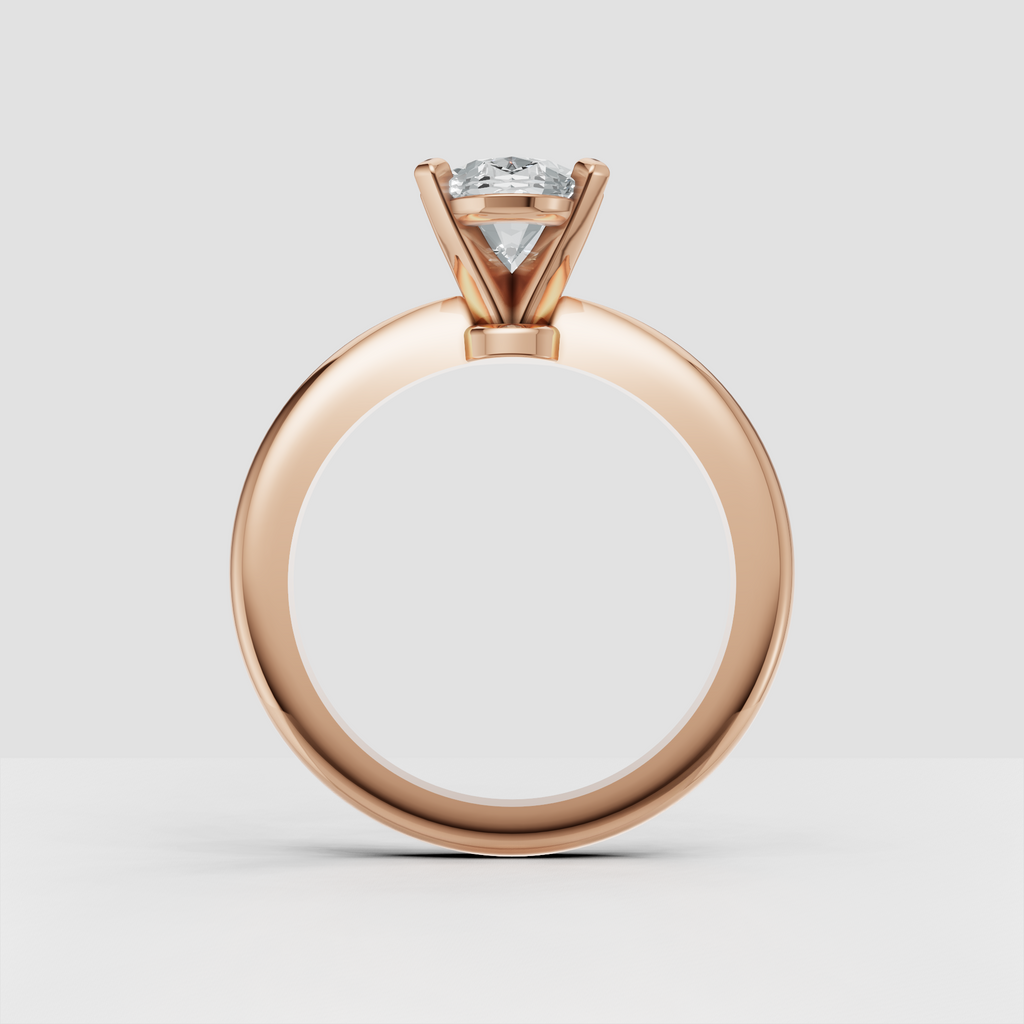 Yellow gold oval engagement ring featuring a high-profile solitaire setting