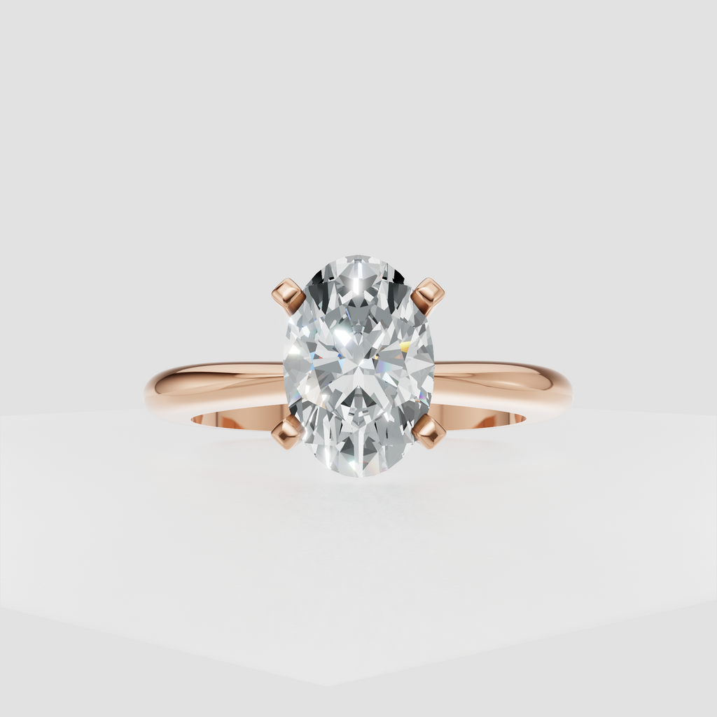 Minimalist gold engagement ring with elongated oval center diamond