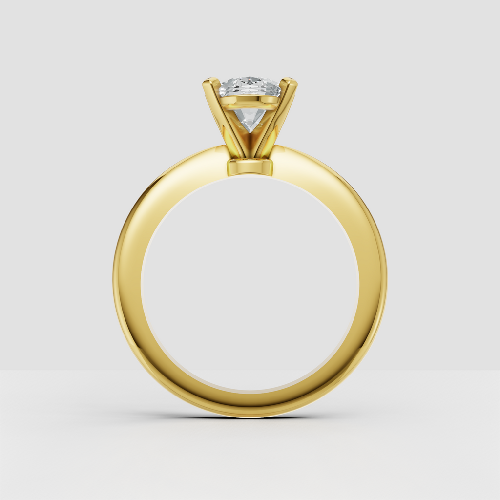 Yellow gold oval diamond engagement ring with elegant minimalist design