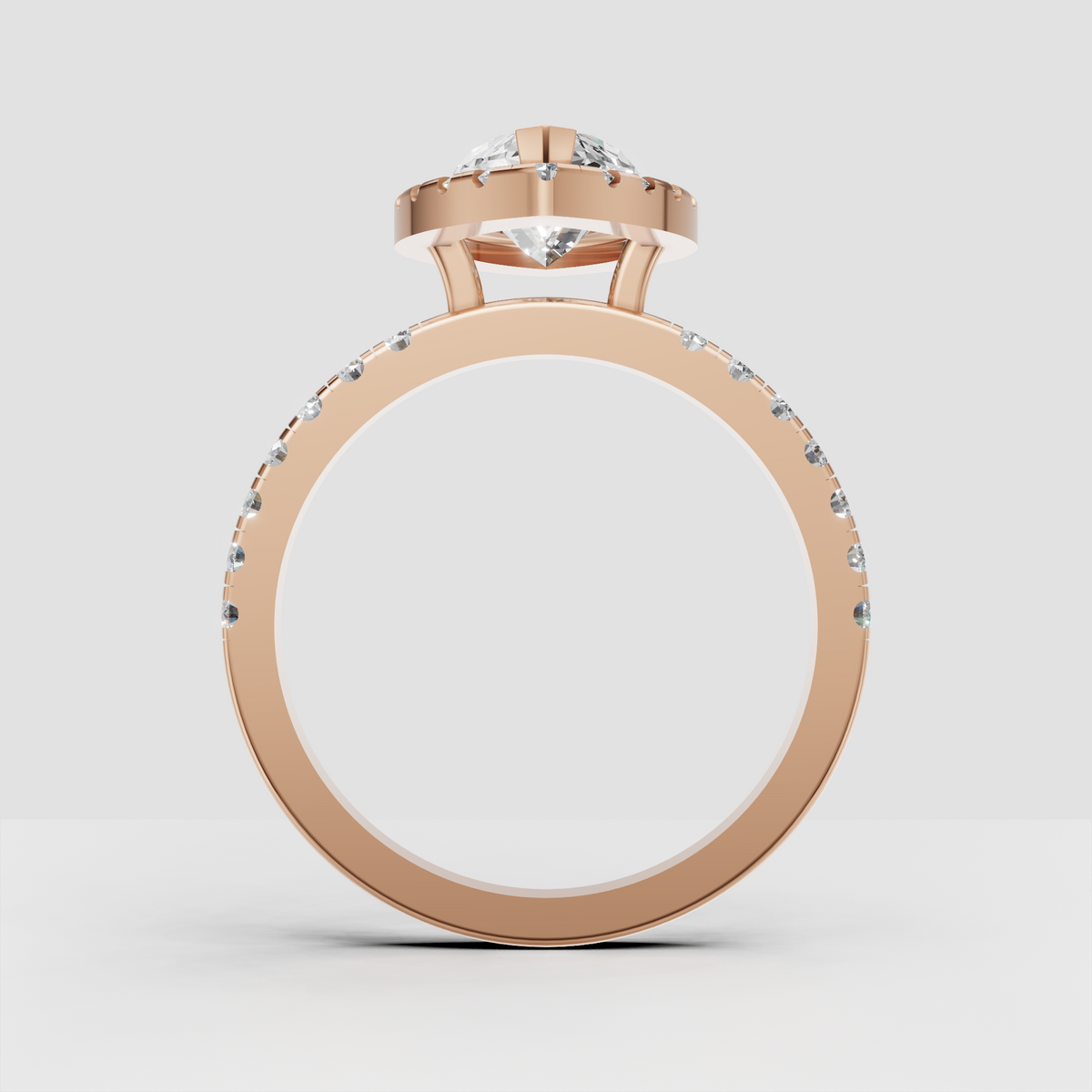 Elegant yellow gold engagement ring with an elongated marquise center stone.
