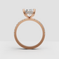 Radiant diamond ring with four rounded gold prongs