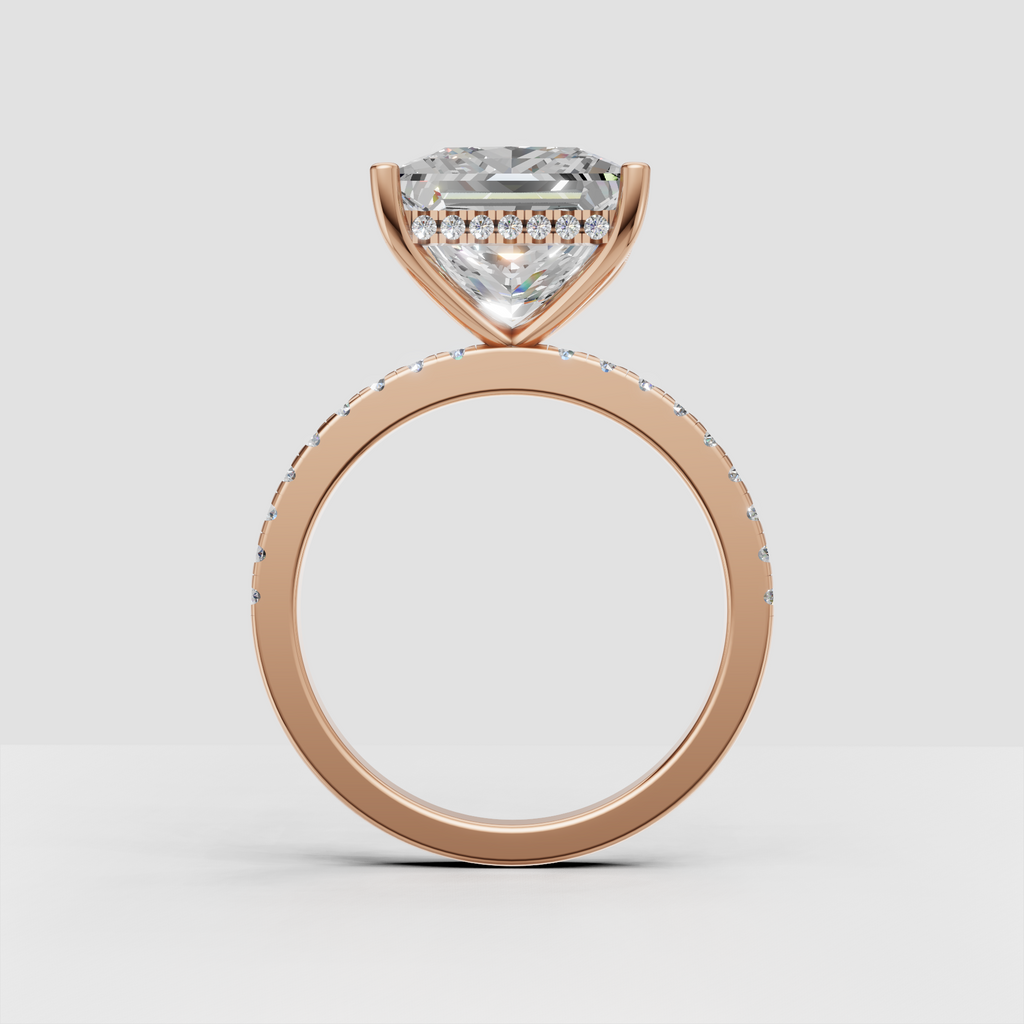Princess cut diamond hidden halo engagement ring with contemporary cathedral profile.