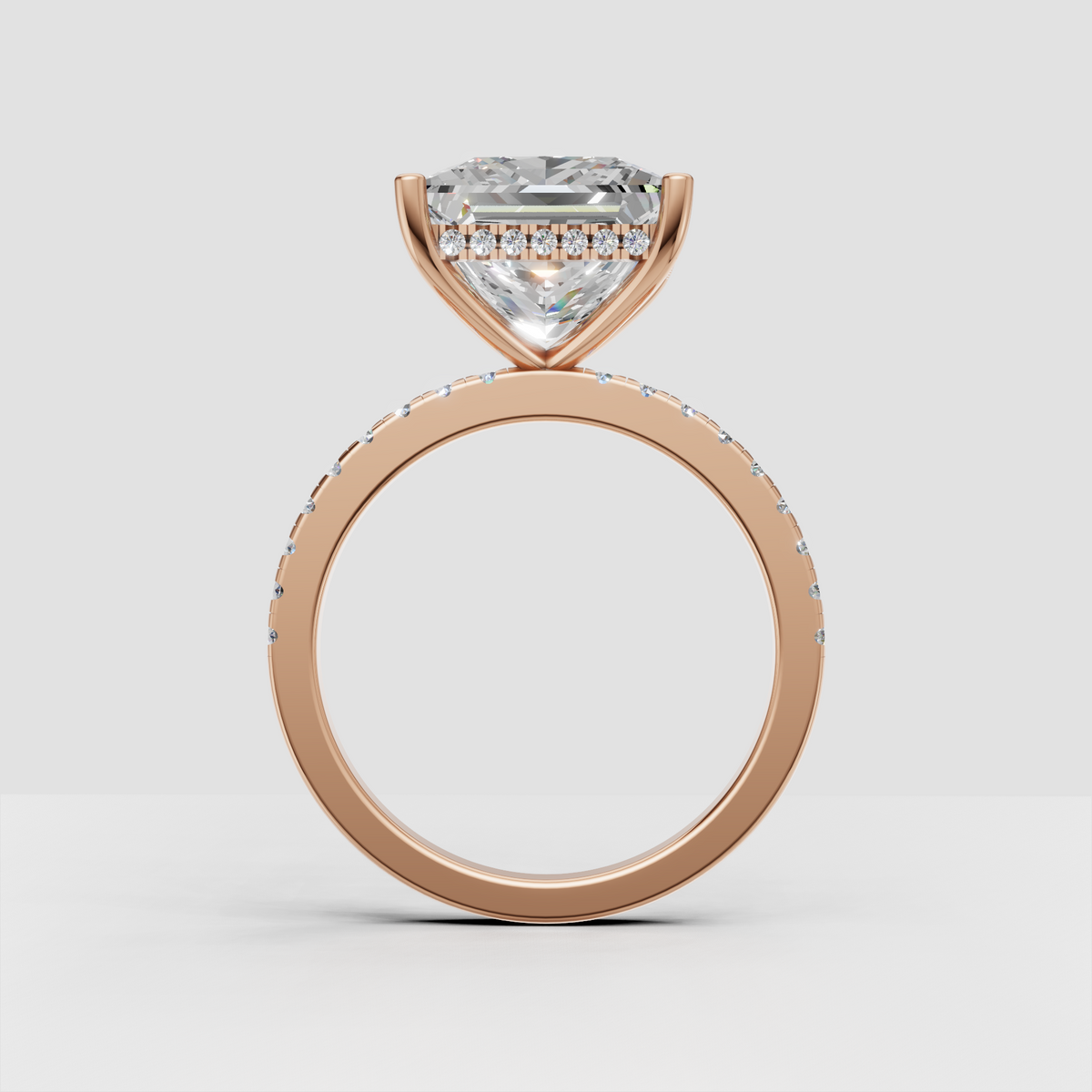 Princess cut diamond hidden halo engagement ring with contemporary cathedral profile.