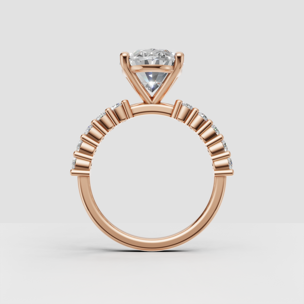 Oval diamond engagement ring with rectangular baguette side stones