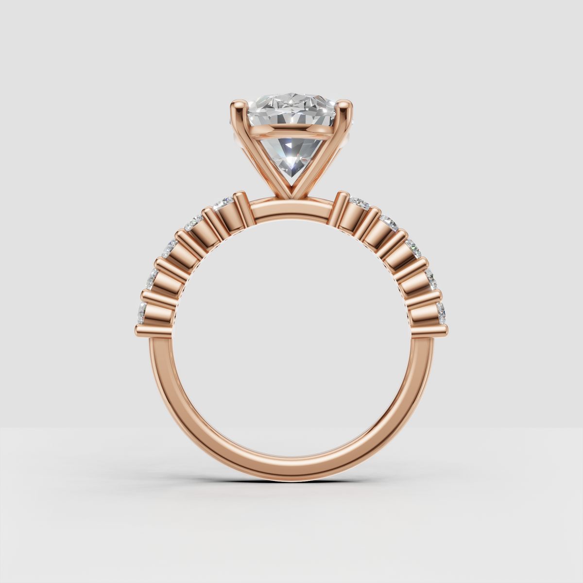 Oval diamond engagement ring with rectangular baguette side stones