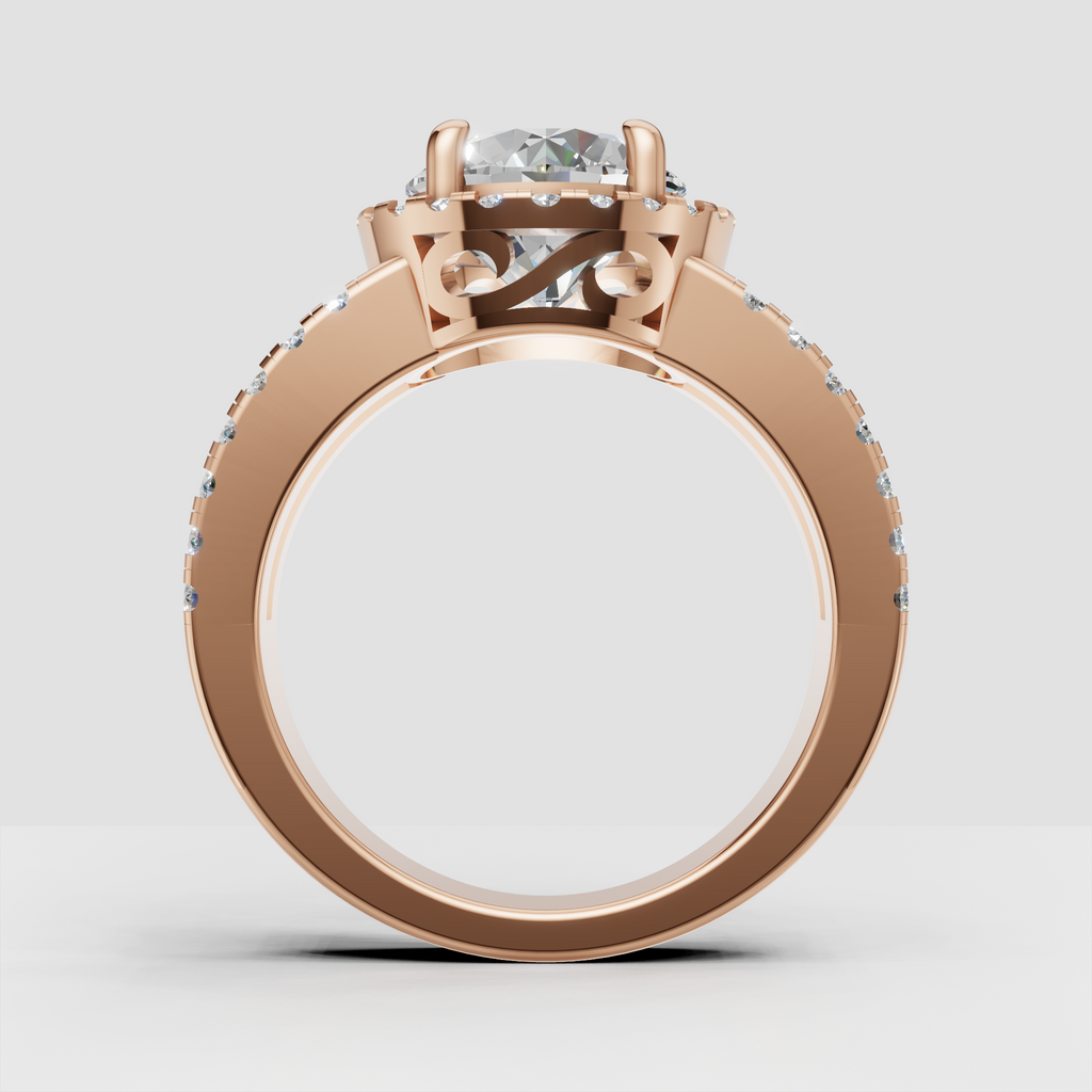 Detailed round diamond ring with pave split shank and decorative gallery