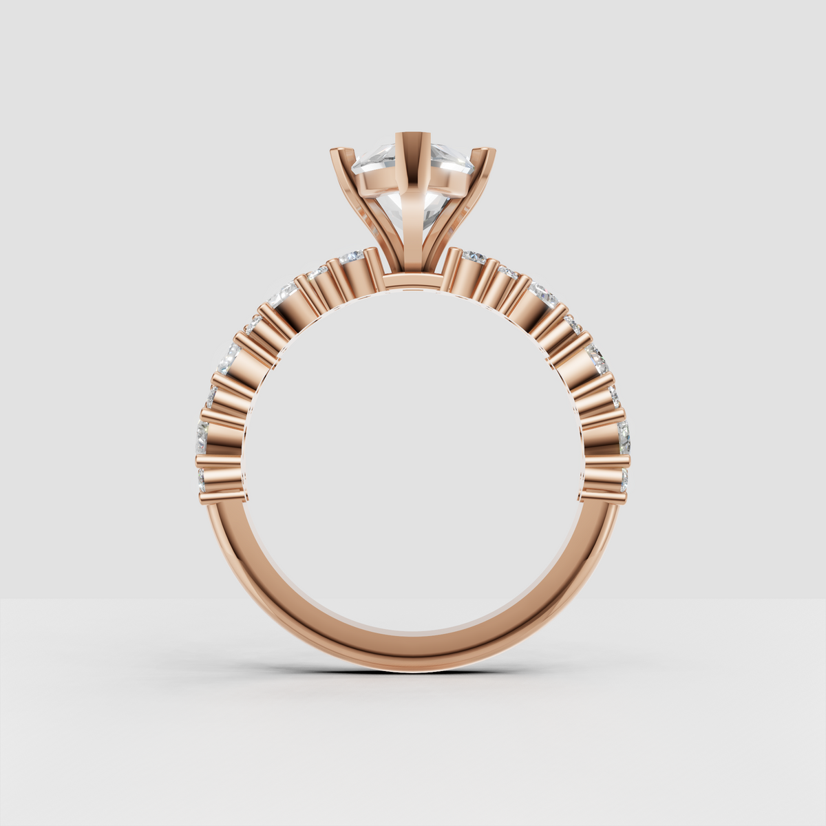 Yellow gold prong set marquise diamond solitaire with sparkling shoulders