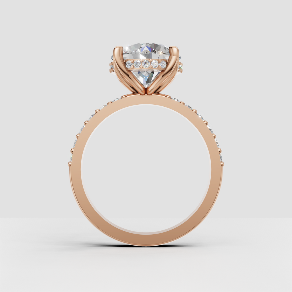 Side view of round diamond ring with elevated prong setting