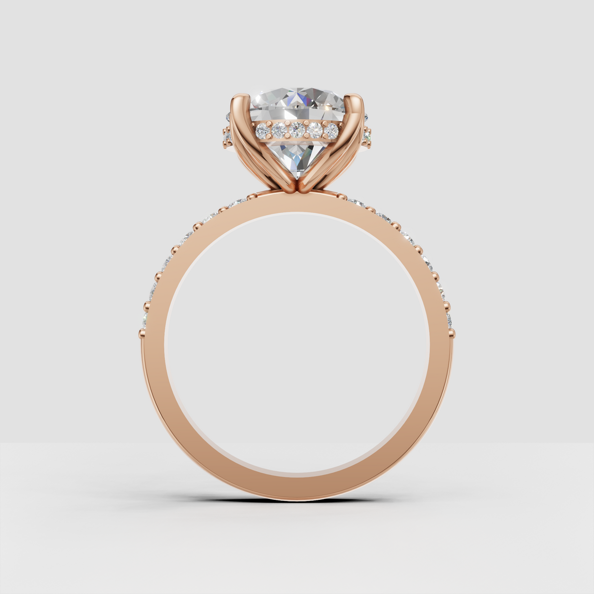 Side view of round diamond ring with elevated prong setting