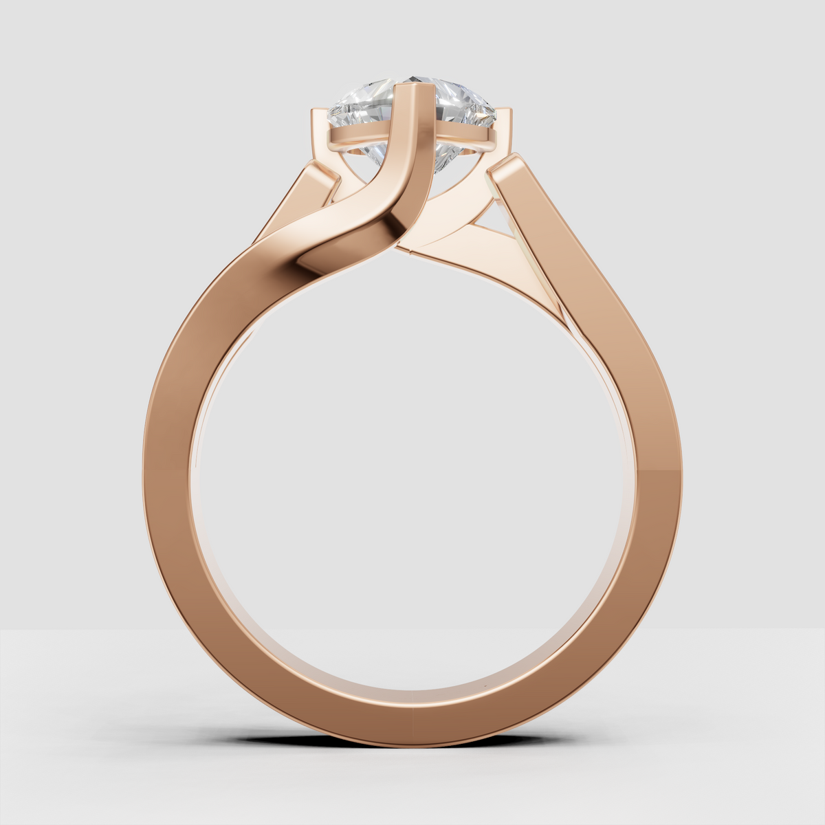 Heart-shaped solitaire engagement ring with raised prong setting
