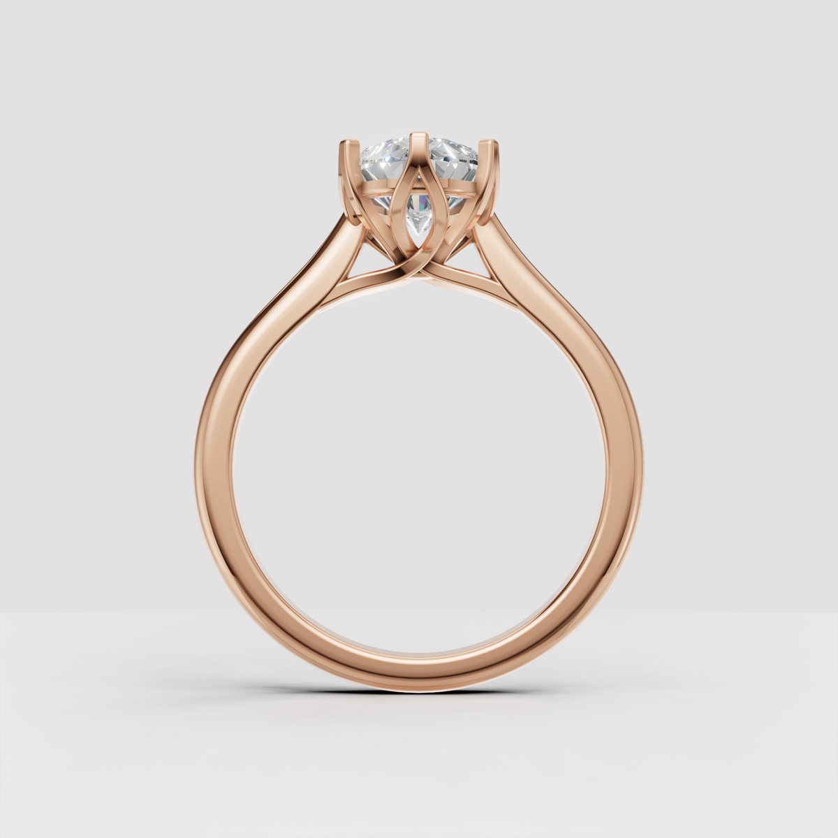 Pear diamond ring featuring a refined six-prong claw setting