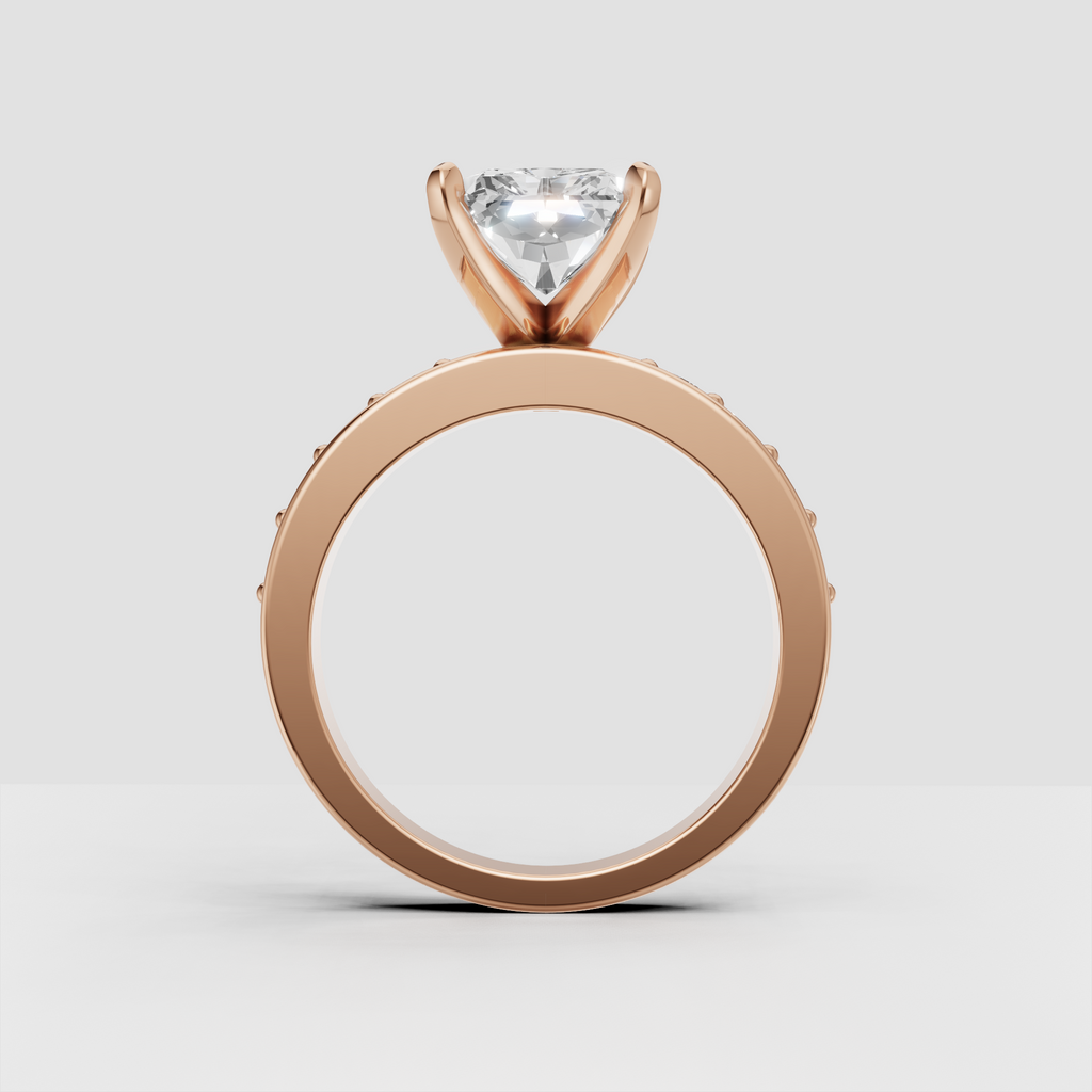 Elegant four-prong diamond engagement ring with sculpted yellow-gold band