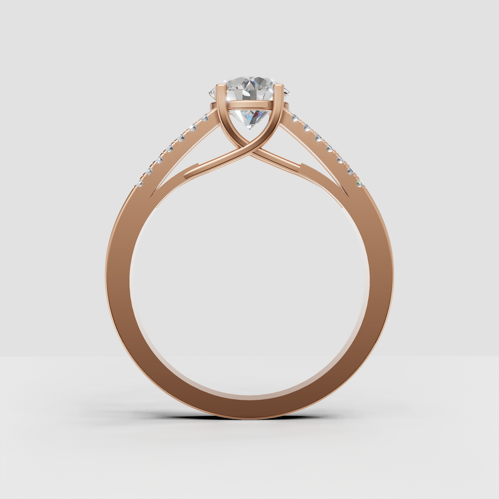 Classic four-prong diamond engagement ring with split-shank band