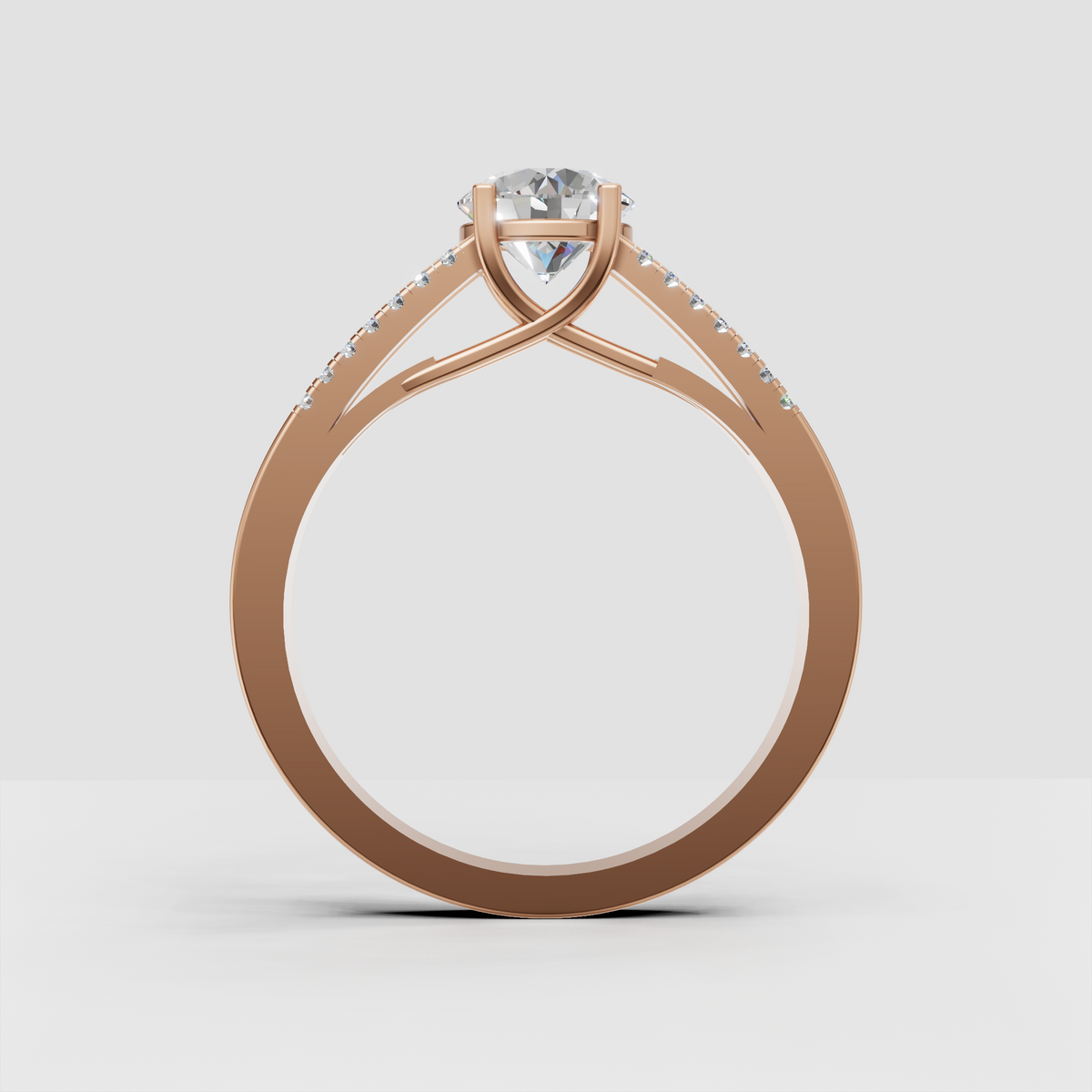 Classic four-prong diamond engagement ring with split-shank band