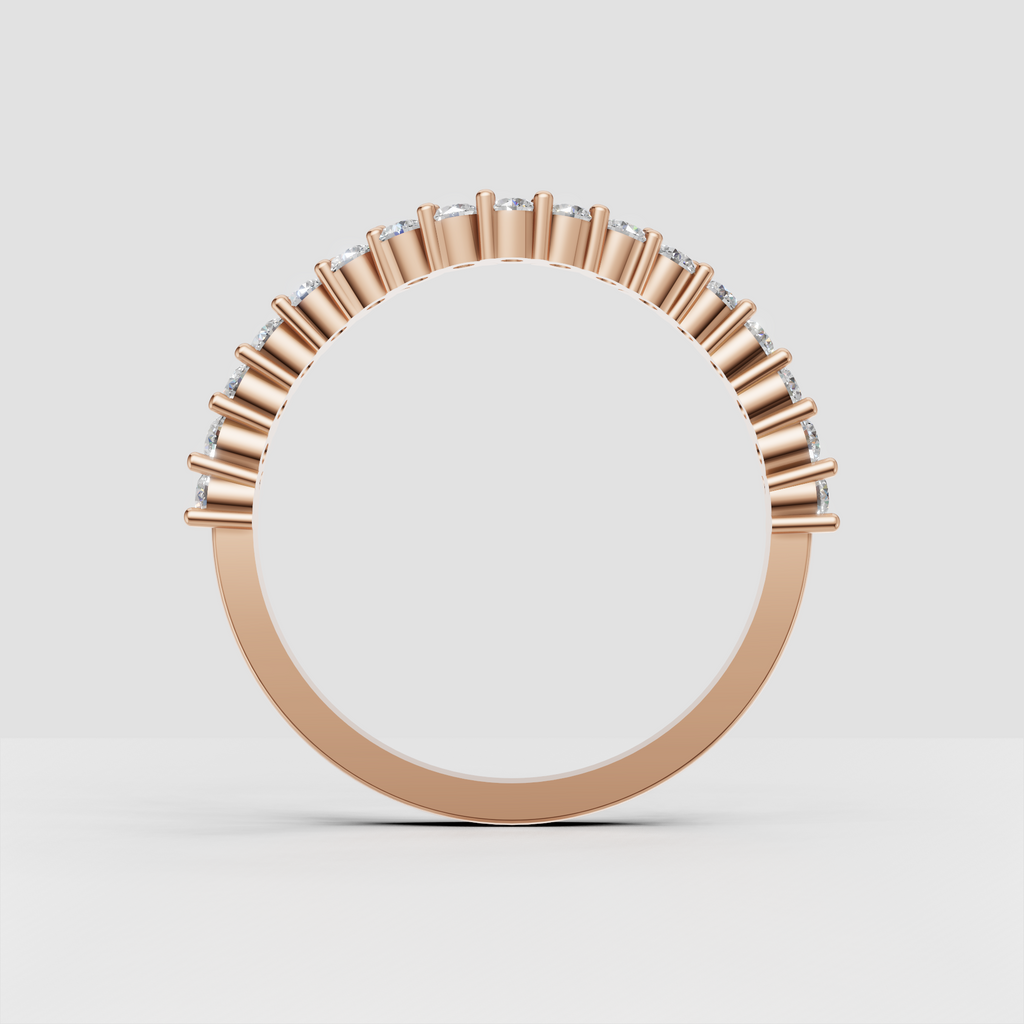 Side view of polished yellow gold round diamond ring
