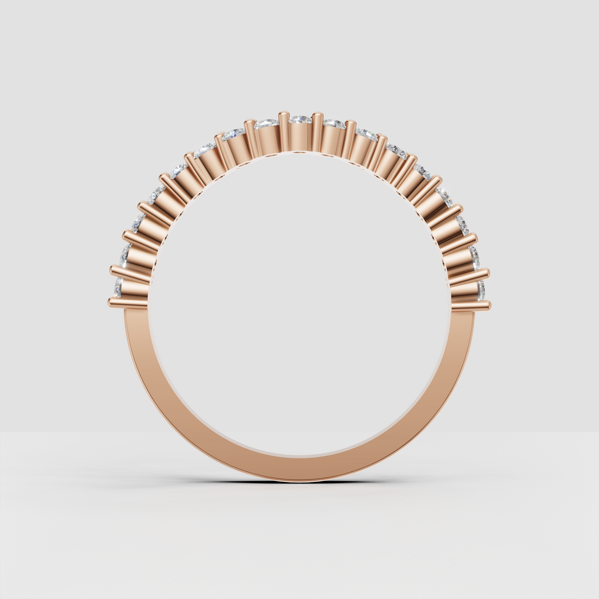 Side view of polished yellow gold round diamond ring
