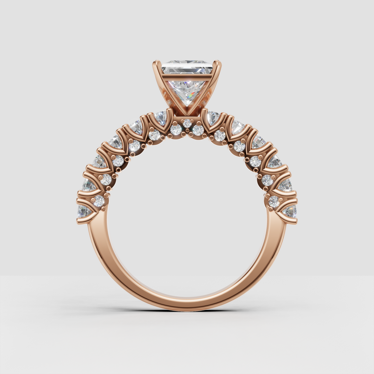 Elegant yellow gold princess ring with half-eternity diamond band